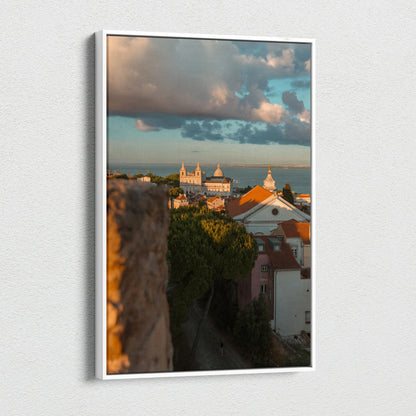 Vertical canvas wall art print of a city skyline at sunset with dramatic clouds and historic buildings.