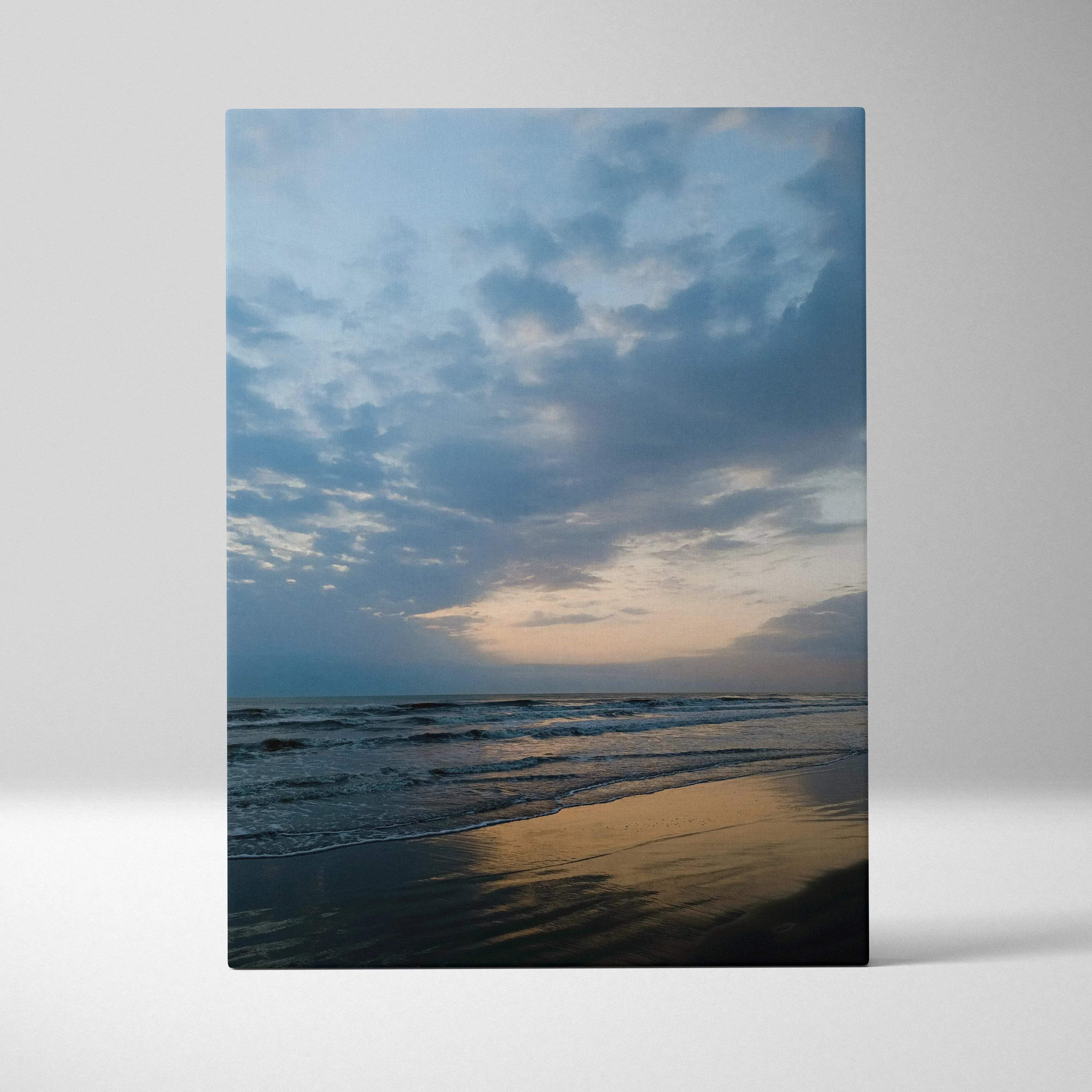 Beige and blue ocean sunset canvas wall art featuring a serene beach seascape in warm orange and blue tones for living room decor