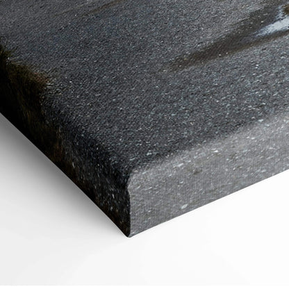 Close-up of textured canvas edge on coastal lighthouse wall art print.