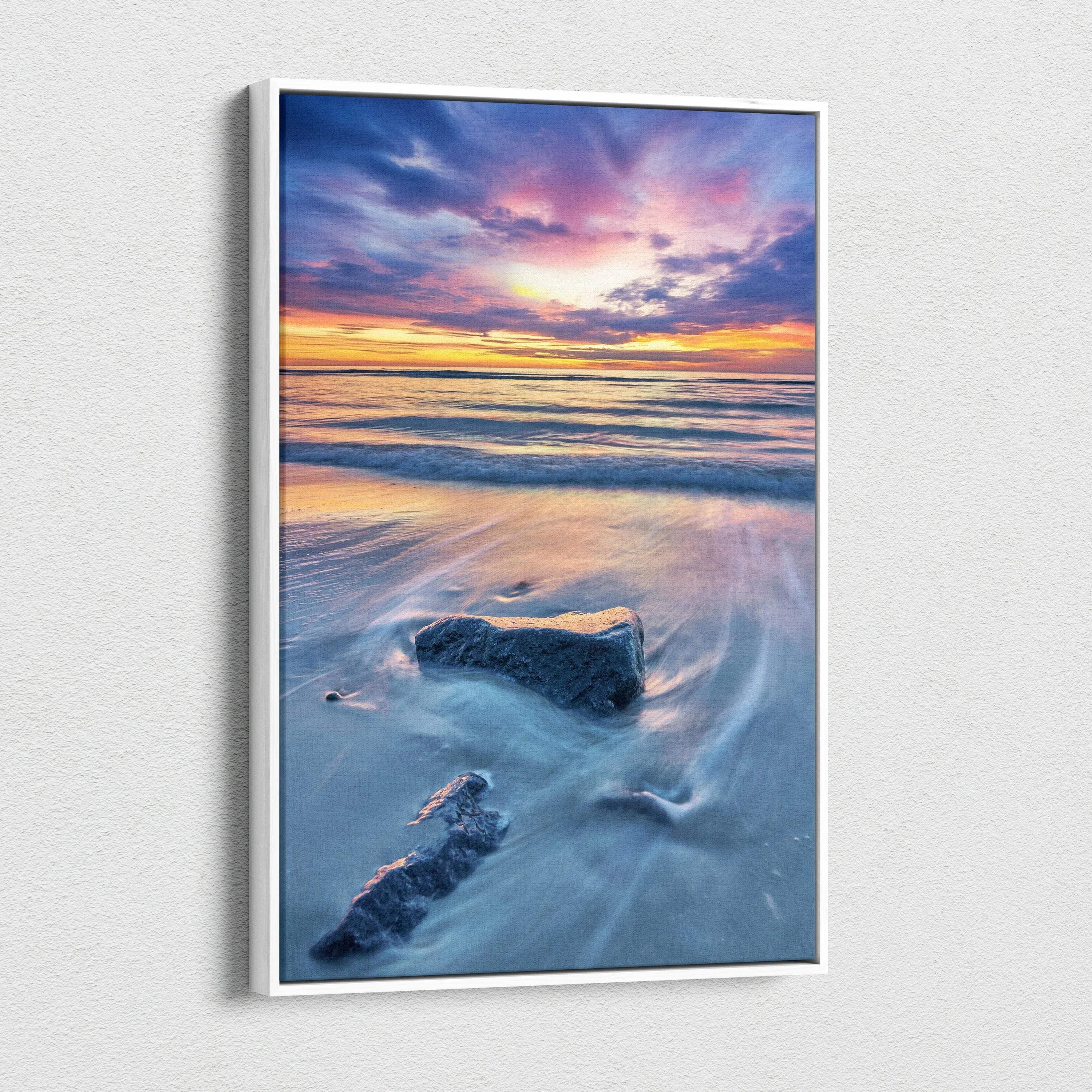 Canvas wall art of a tranquil beach sunset with soft waves and colorful sky.