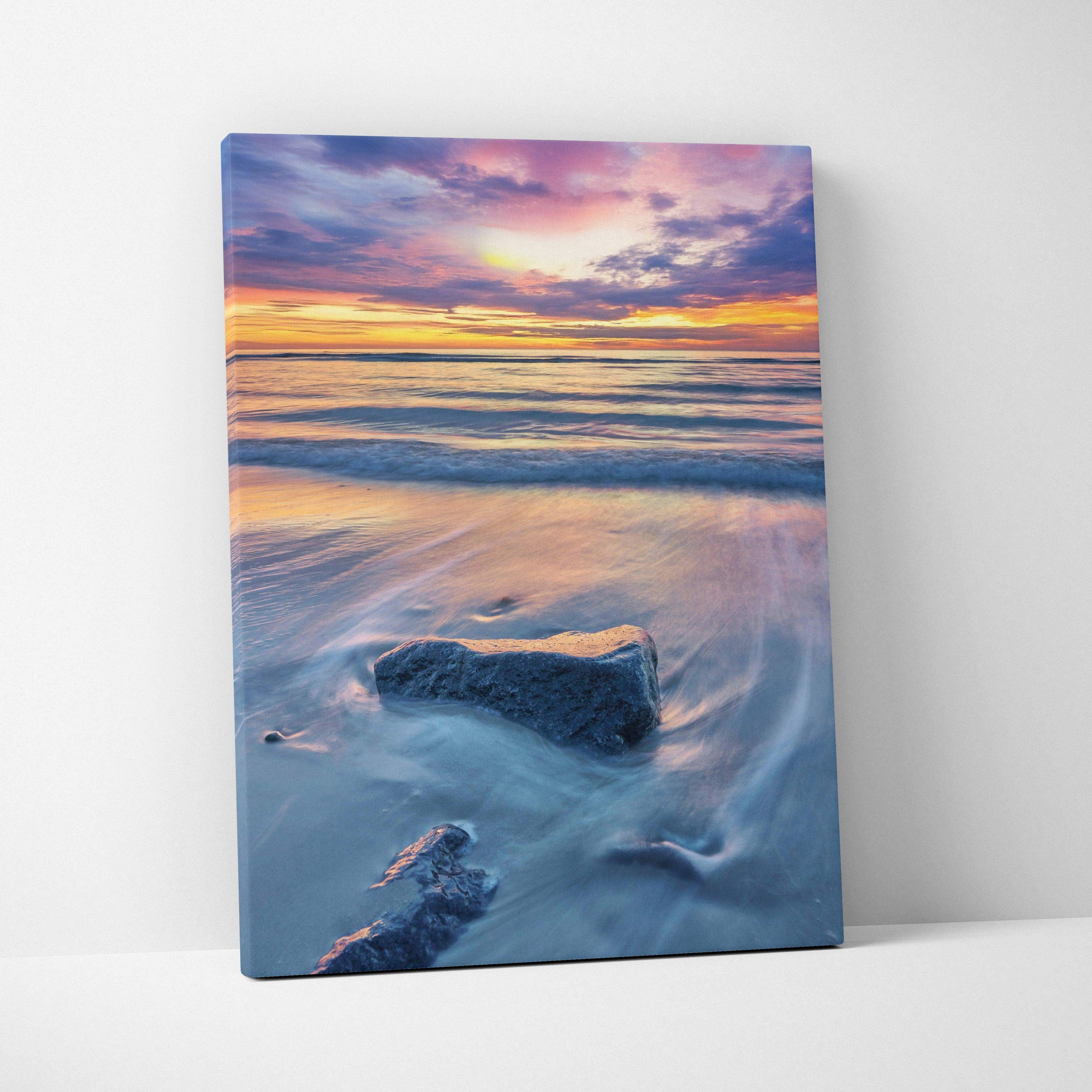 Canvas wall art featuring a tranquil beach sunset with colorful sky and gentle waves.