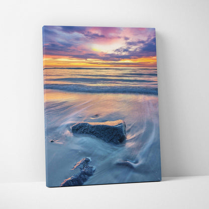 Canvas wall art featuring a tranquil beach sunset with colorful sky and gentle waves.