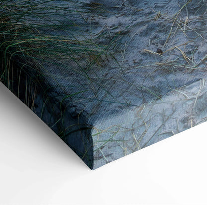 Close-up of serene beach sunset canvas wall art corner with sand and grass texture.