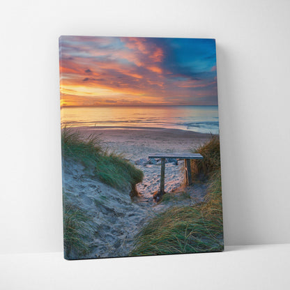 Canvas wall art featuring a serene beach sunset with sandy path and grassy dunes.