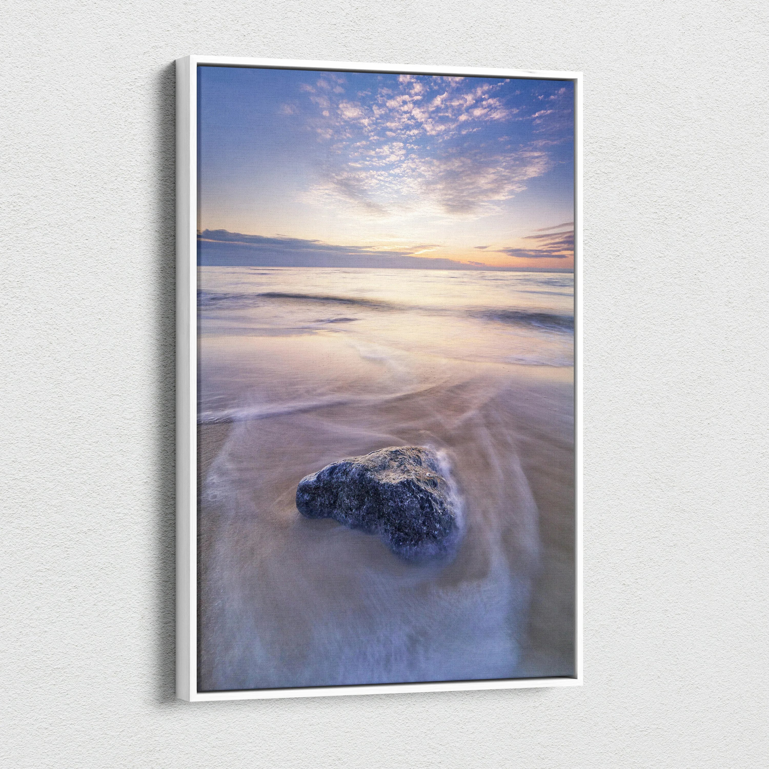 Serene beach sunset canvas wall art with soft waves and vibrant sky in vertical format.
