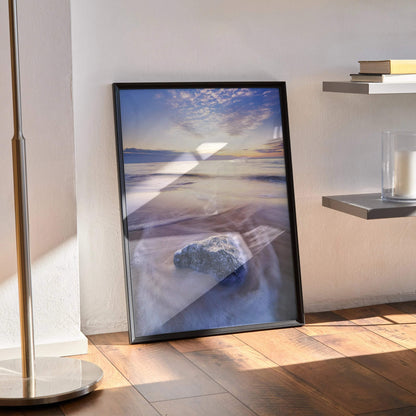 Vibrant beach sunset ocean poster with colorful sky and rock on sand wall art.