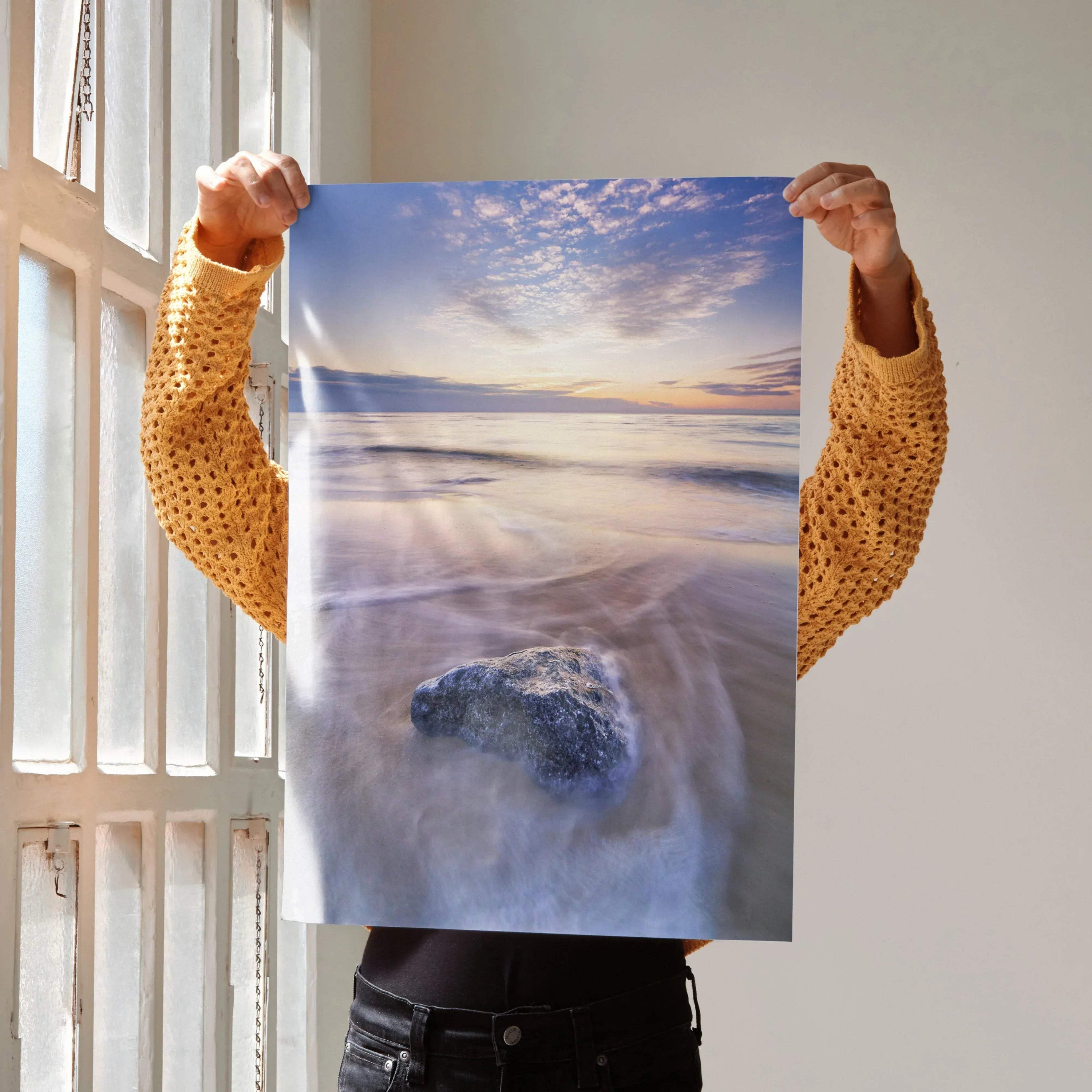 Vibrant beach sunset ocean wall art poster with colorful sky and rock on sandy shore.
