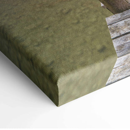 Close-up of textured green canvas corner showcasing vibrant beach sunset wall art detail.