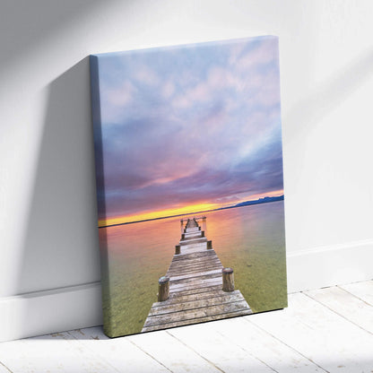 Vibrant beach sunset canvas wall art featuring a wooden pier extending into calm water under colorful sky.
