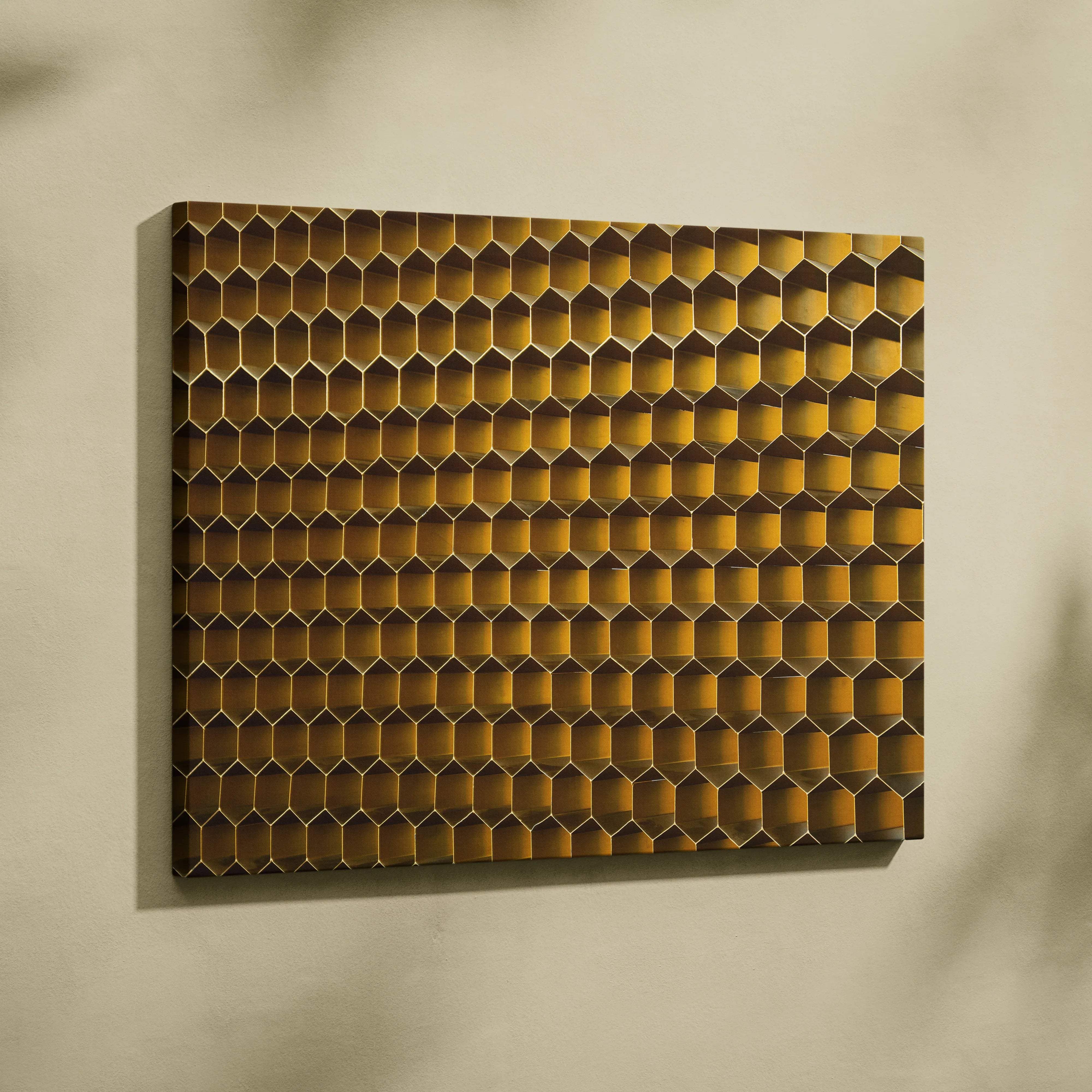 Golden honeycomb wall art with textured metallic finish on canvas