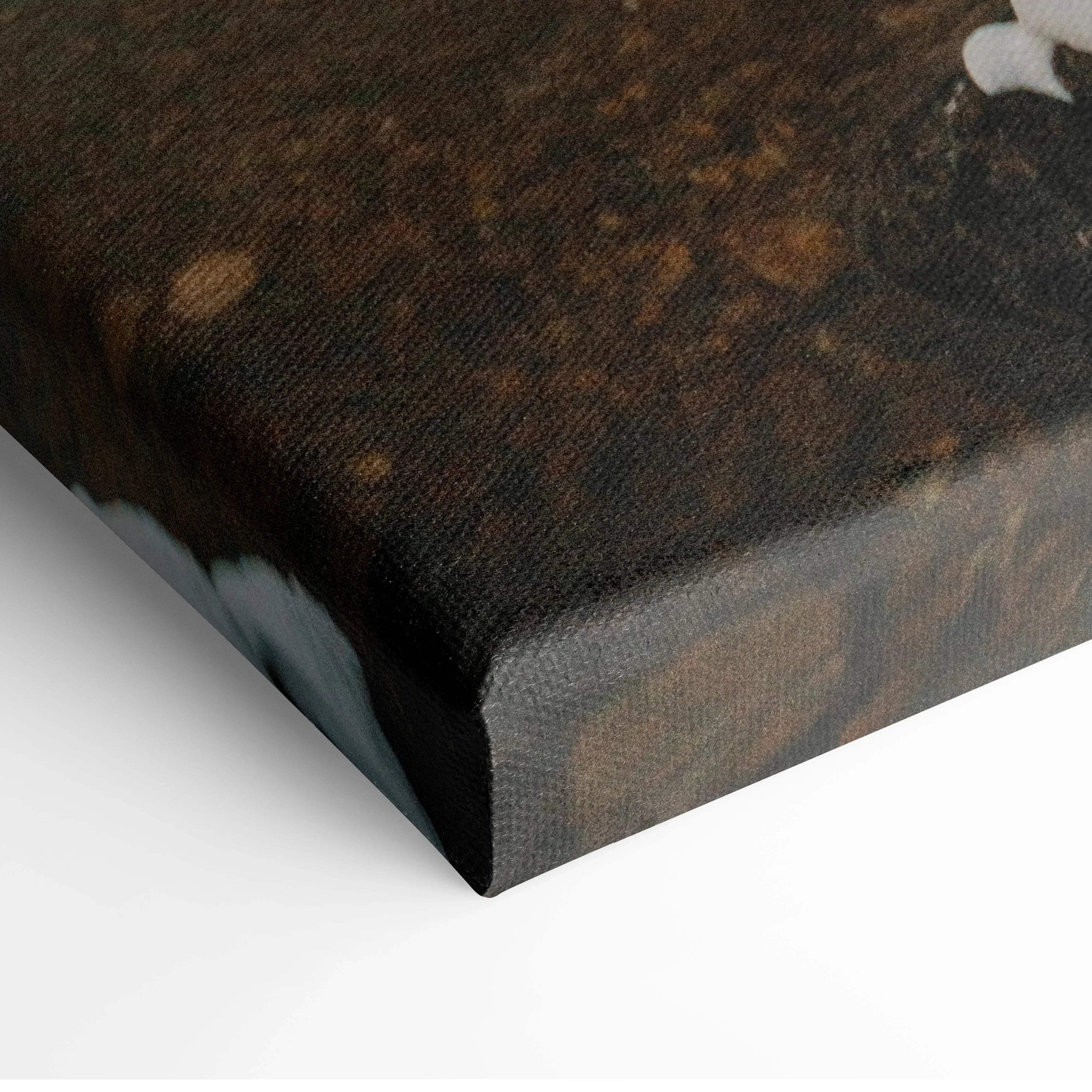 Close-up of canvas wall art corner with textured surface and dark earthy colors.