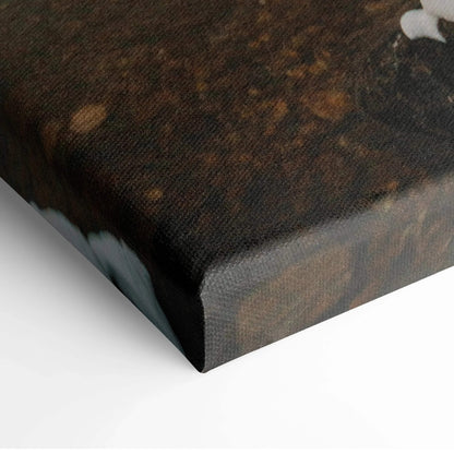 Close-up of canvas wall art corner with textured surface and dark earthy colors.