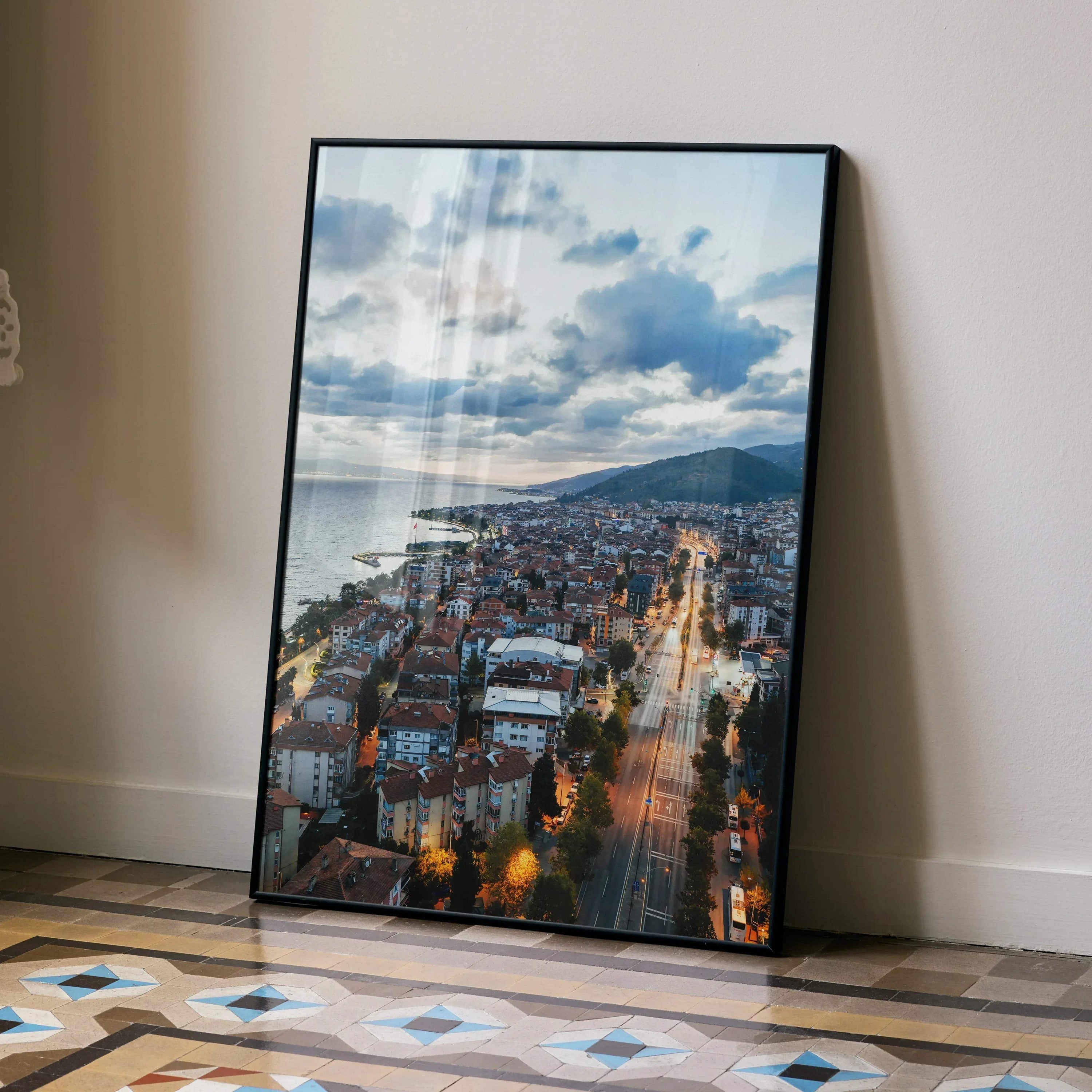 Vertical city sunset poster with illuminated streets and vibrant sky wall art.