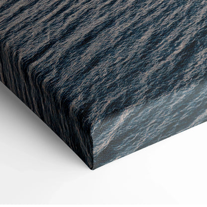 Canvas wall art featuring detailed textured ocean waves in deep blue and gray tones.