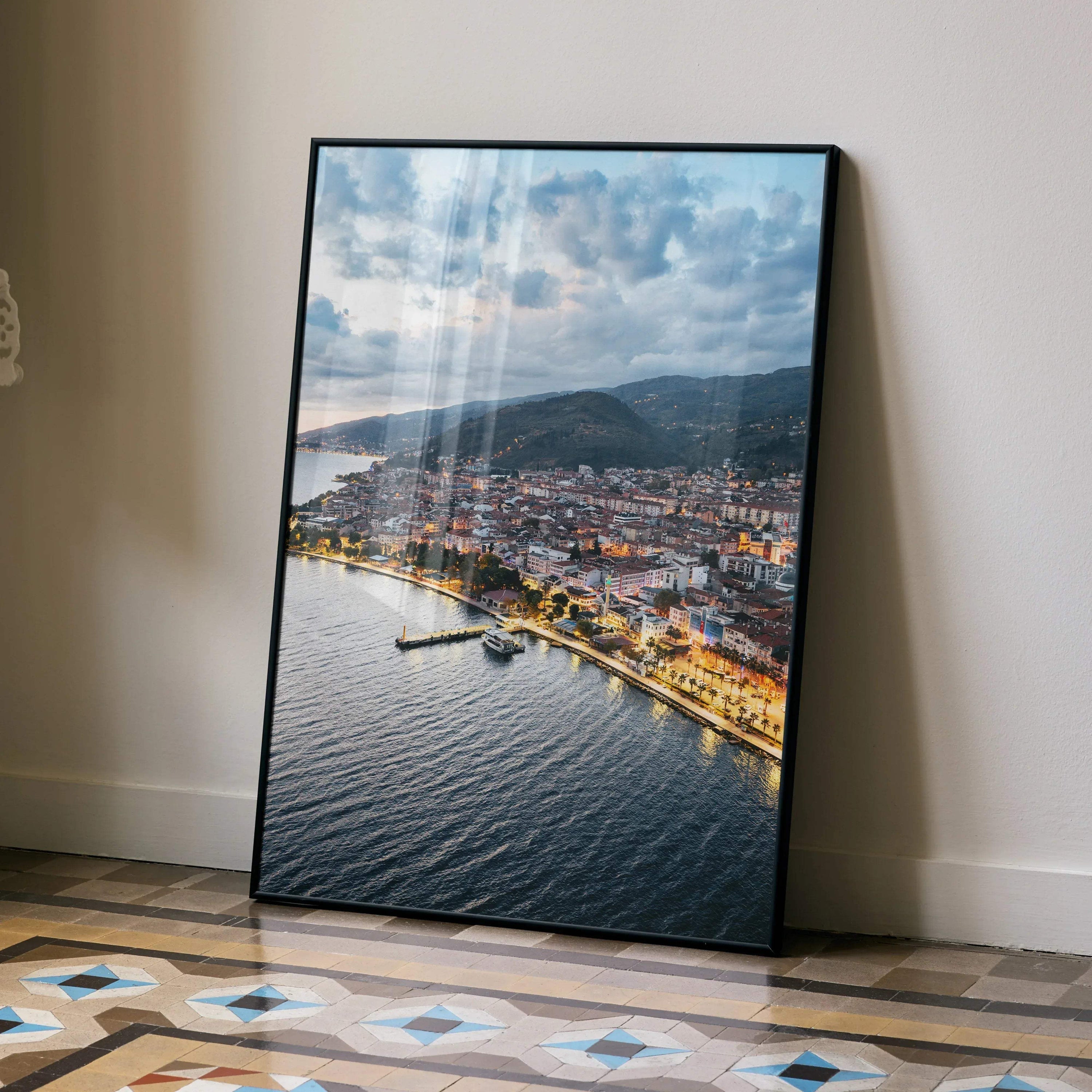 Vibrant city sunset poster showing illuminated waterfront and buildings against dramatic sky wall art.