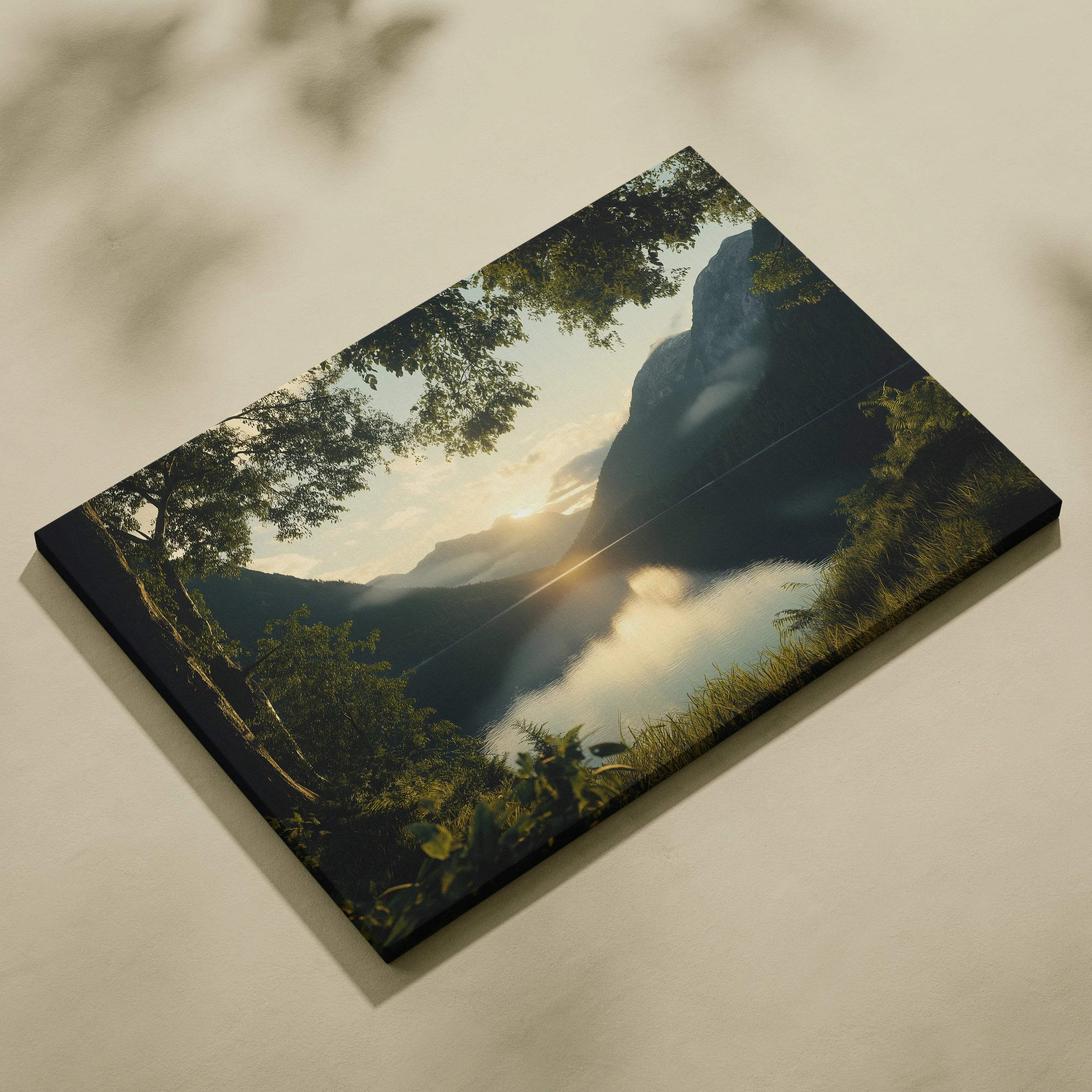 Canvas print of serene mountain sunset over lake in golden hour