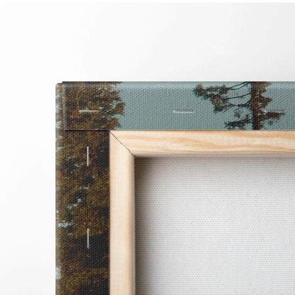 Light wood frame canvas print of serene forest lake mountains in golden hour teal sky