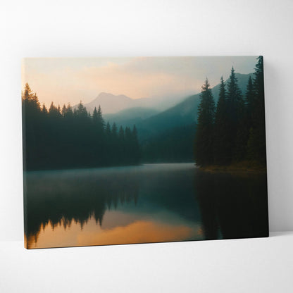Canvas print of serene misty mountain lake at sunset with orange reflections