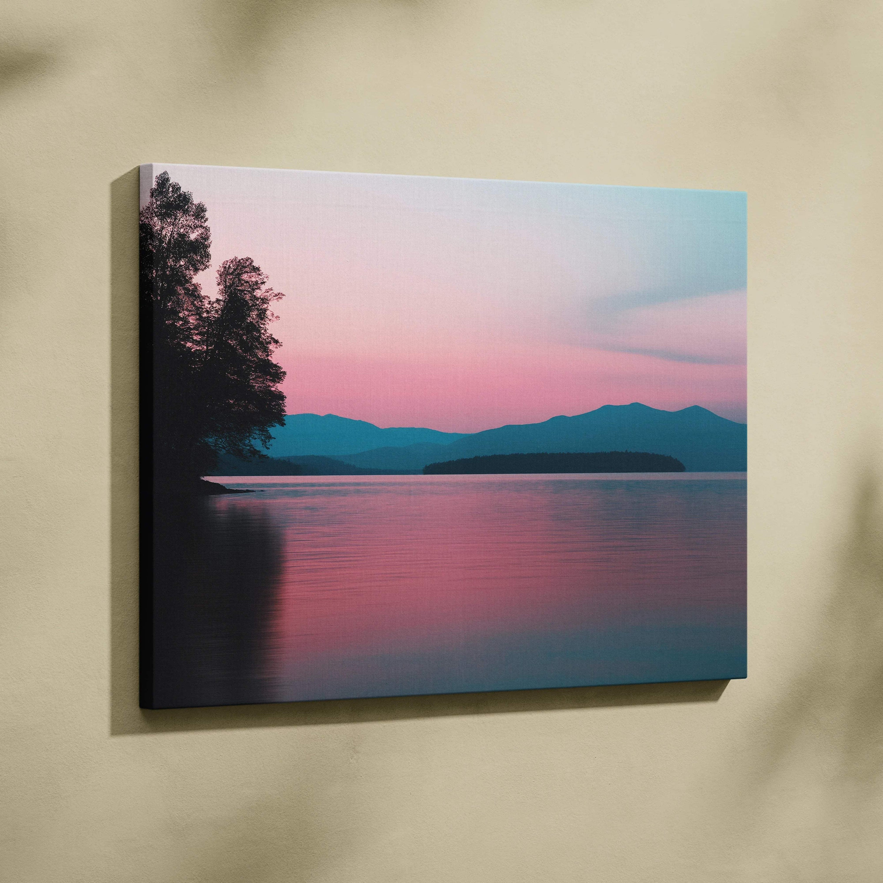 Canvas print of serene lakeside mountains at sunset in calm pink blue tones