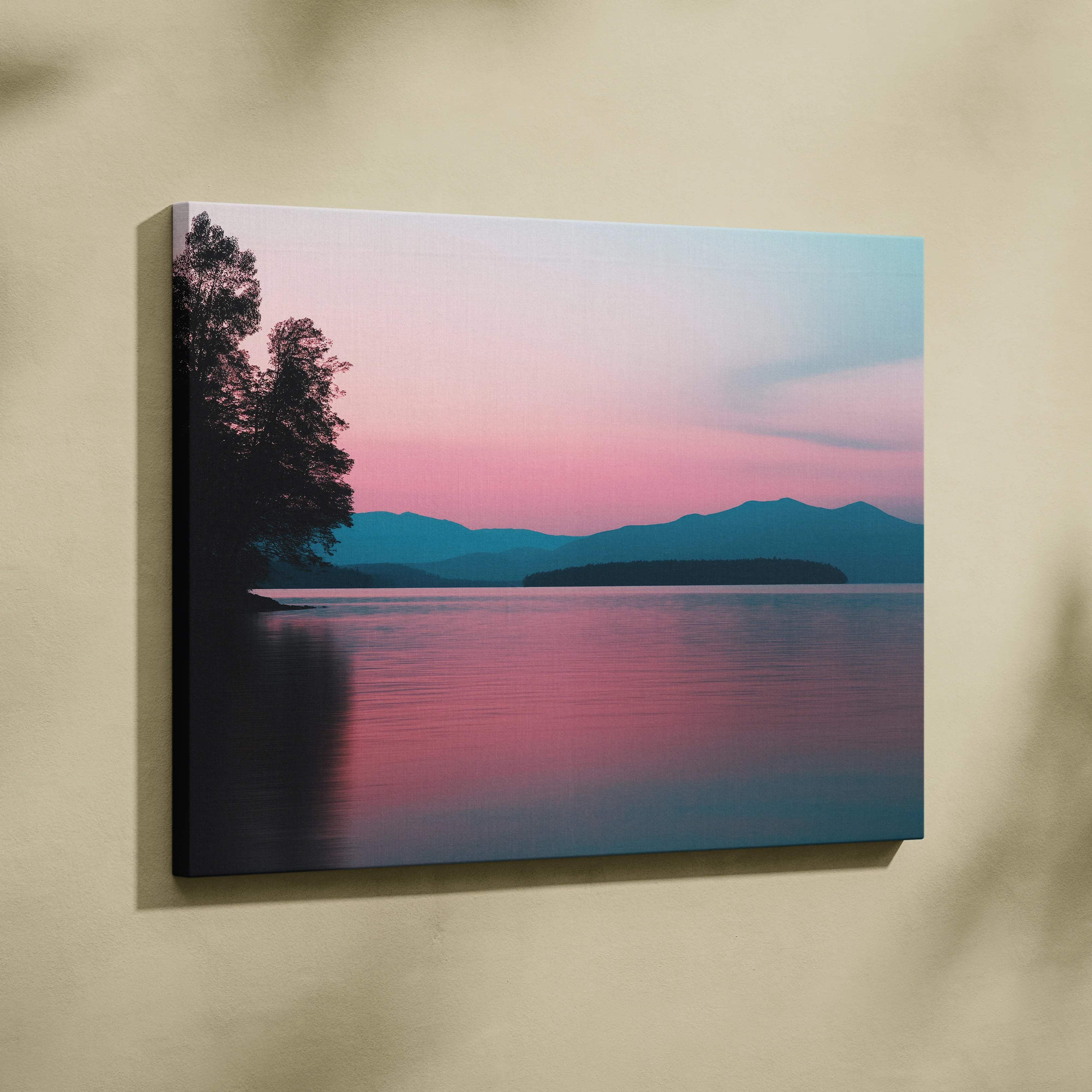 Canvas print of serene lakeside mountains at sunset in calm pink blue tones