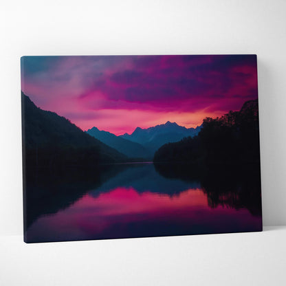 Vibrant canvas print of sunset over mountains reflected in calm lake with pink purple sky