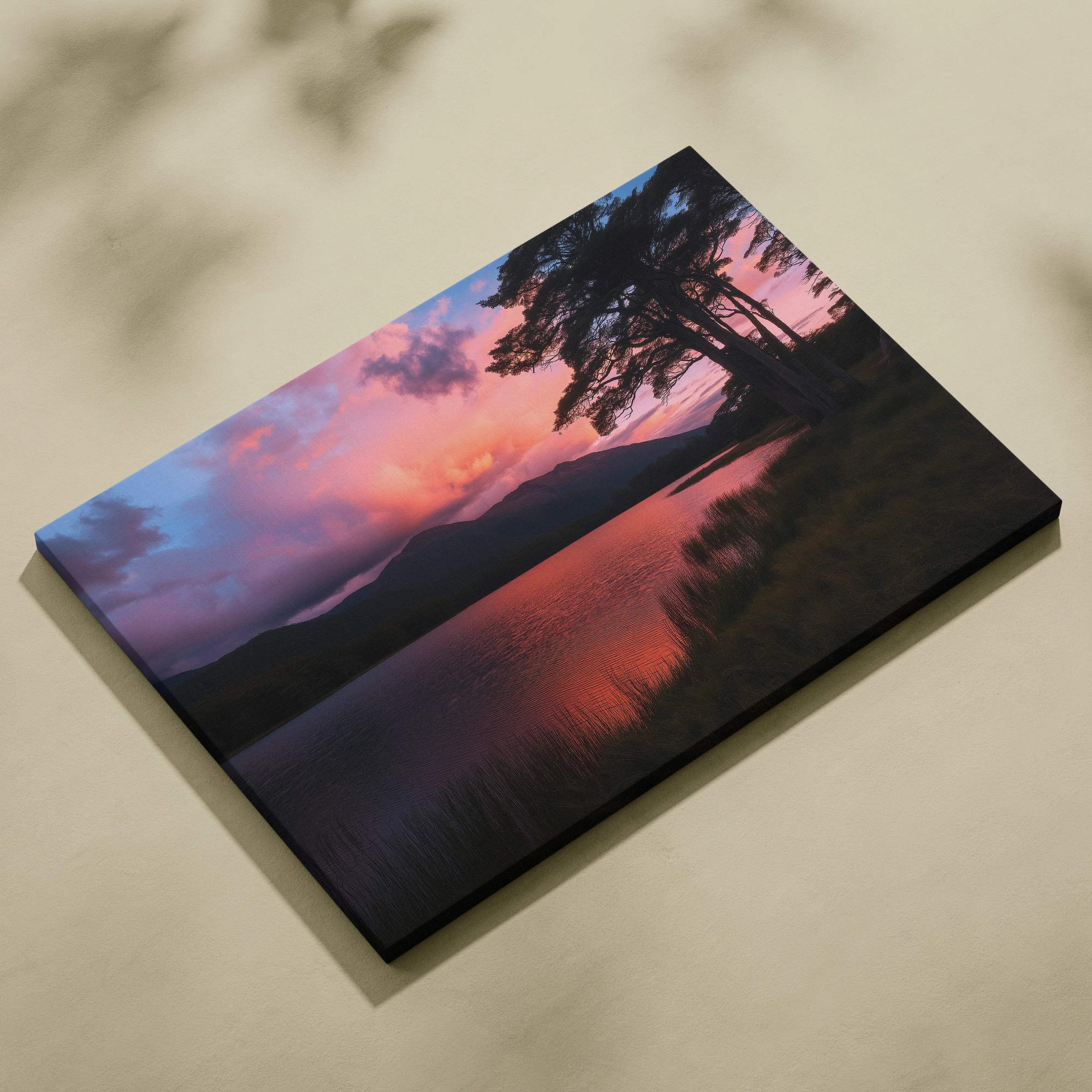 Canvas print of sunset lake with mountains, silhouetted trees reflection