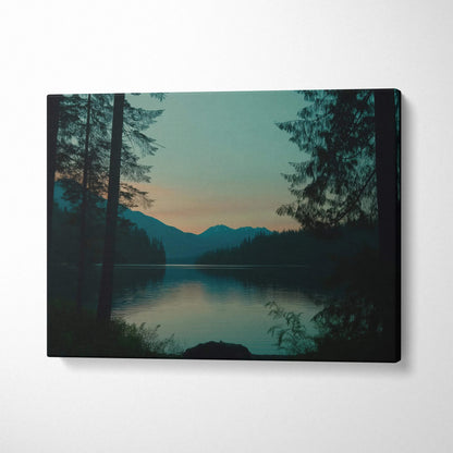 Serene dusk lakeside canvas print with mountains, forest, teal orange sky