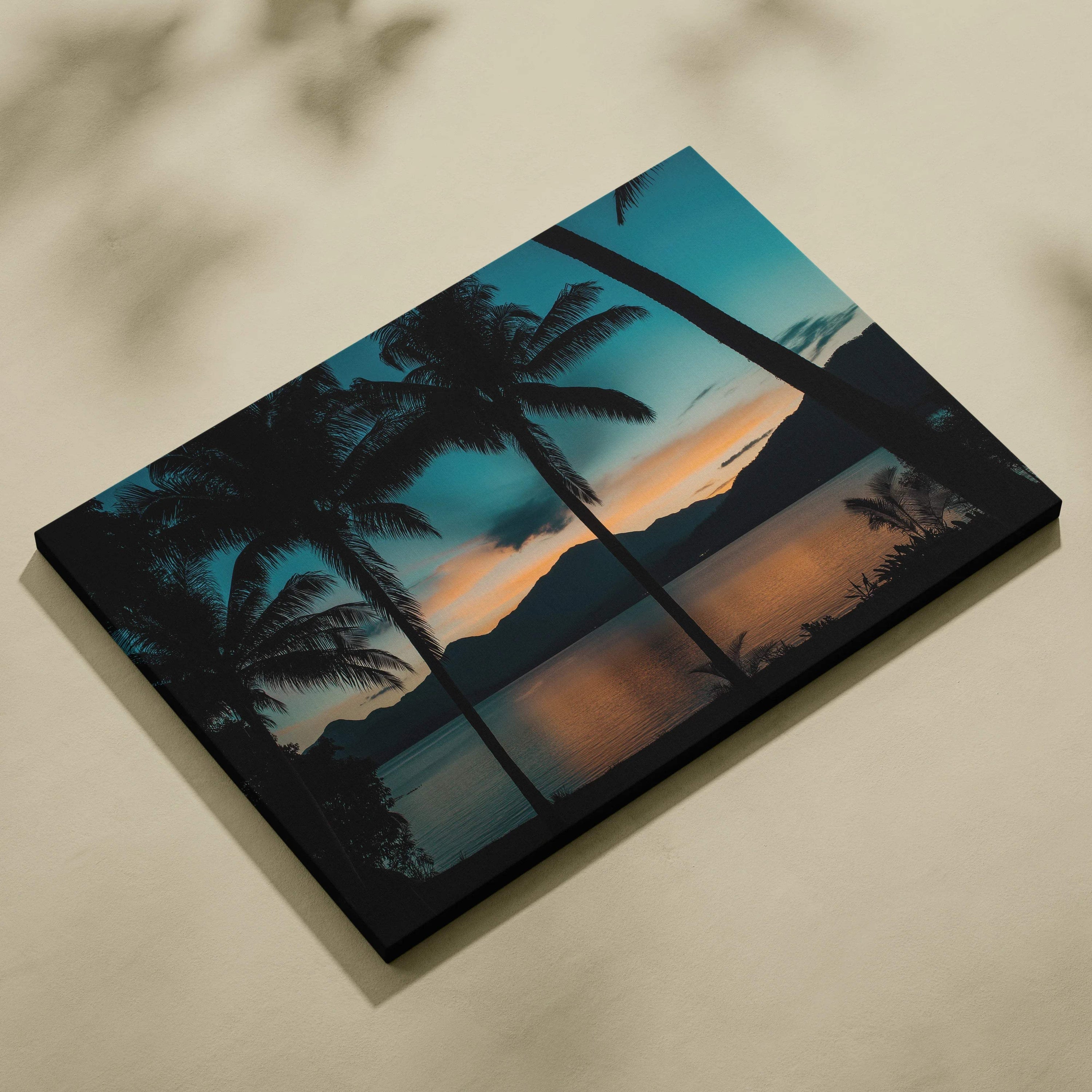 Black-framed canvas of teal orange sunset with palm trees over tranquil lake