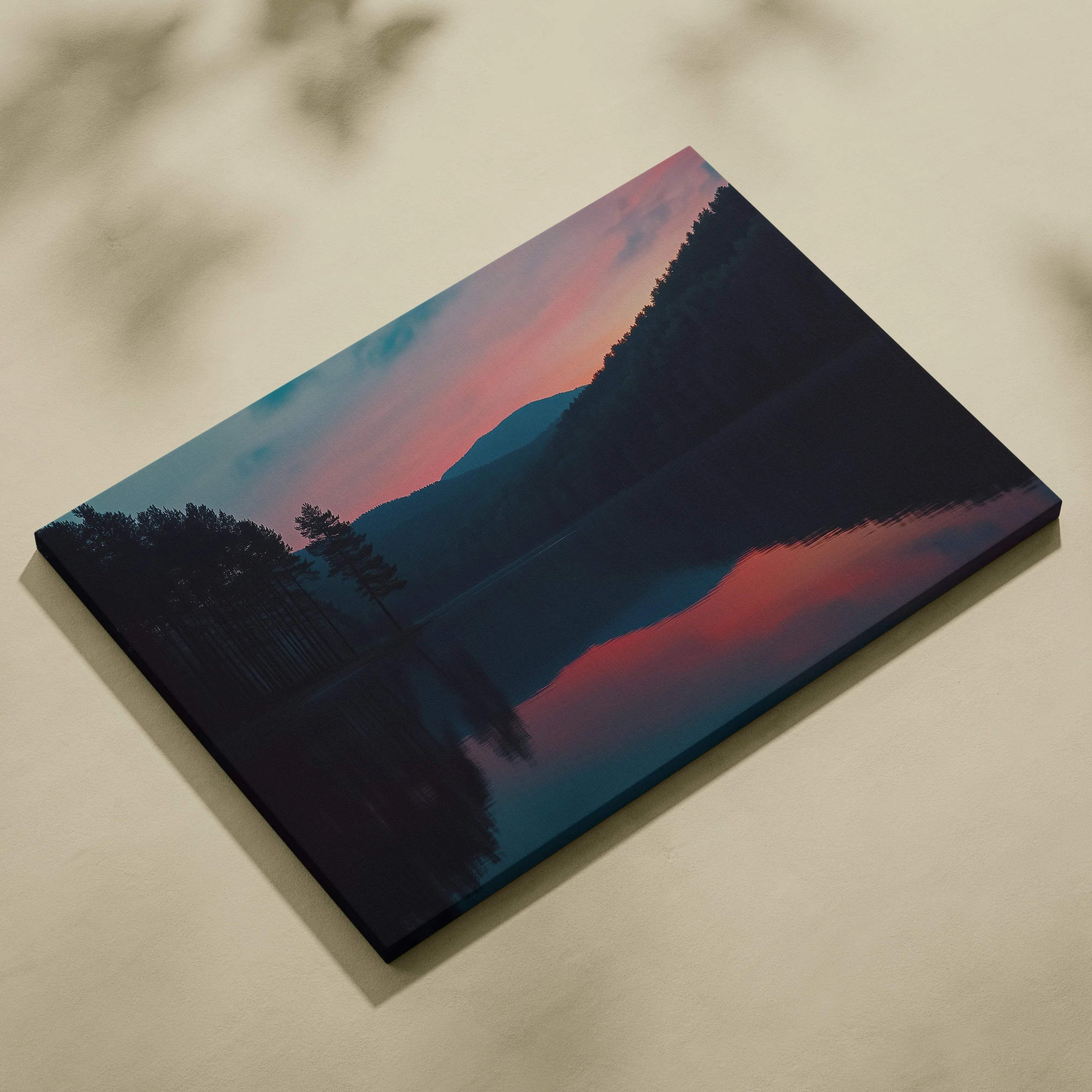 Serene canvas wall art of mountains behind still lake at dusk in blue pink hues