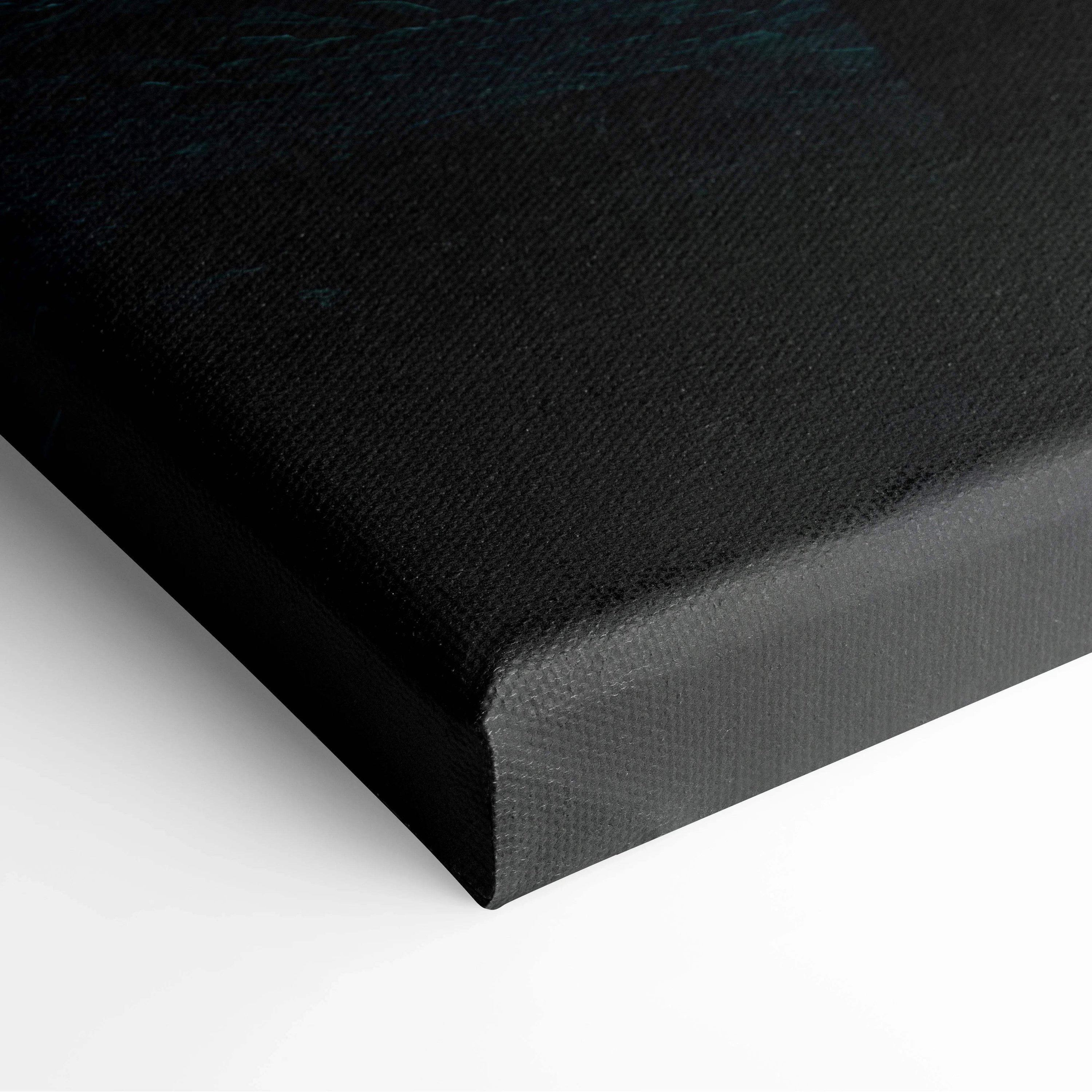Black canvas print of tranquil mountains over still lake at dusk with teal texture