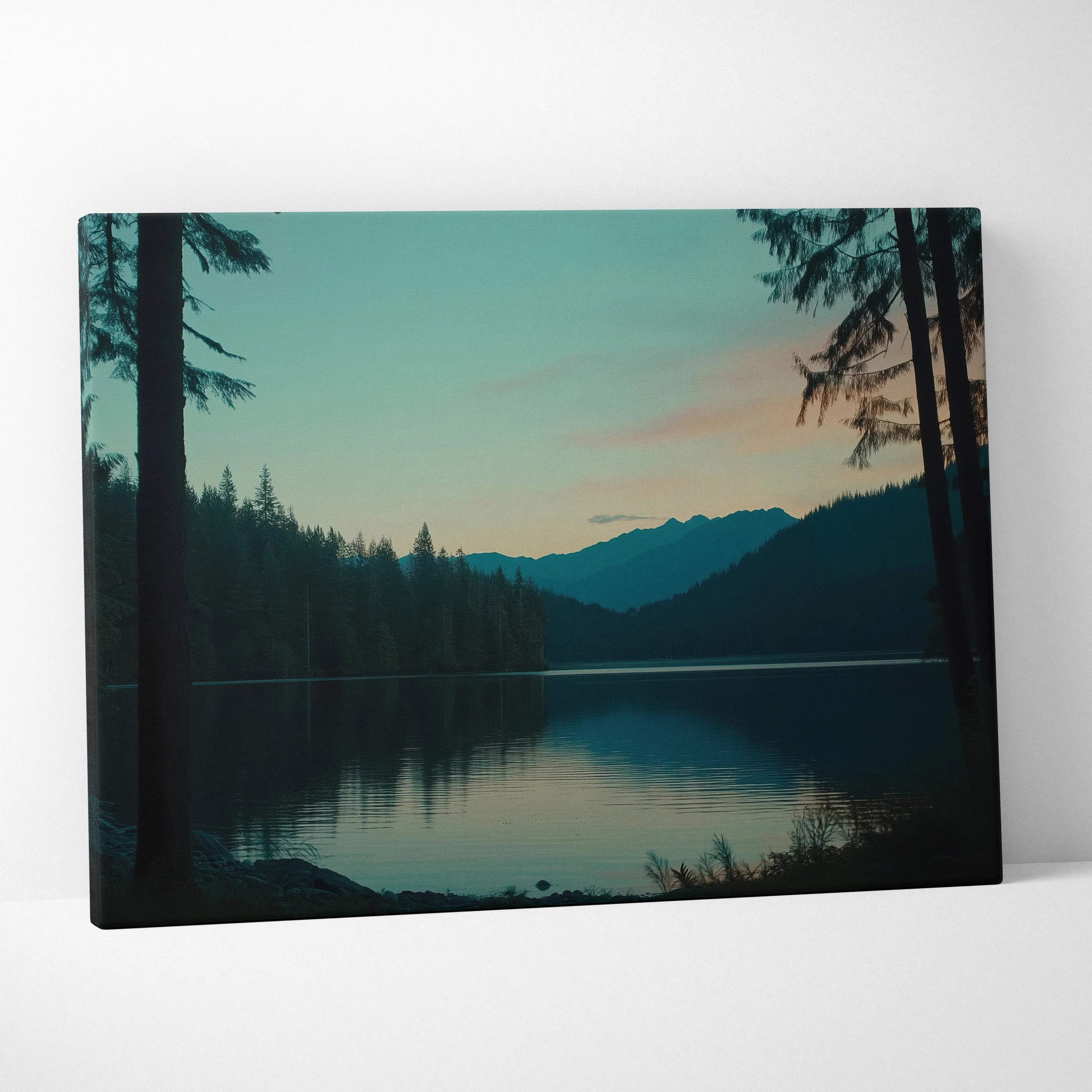 Canvas wall art of serene lake at dusk with pines and mountains in teal blues