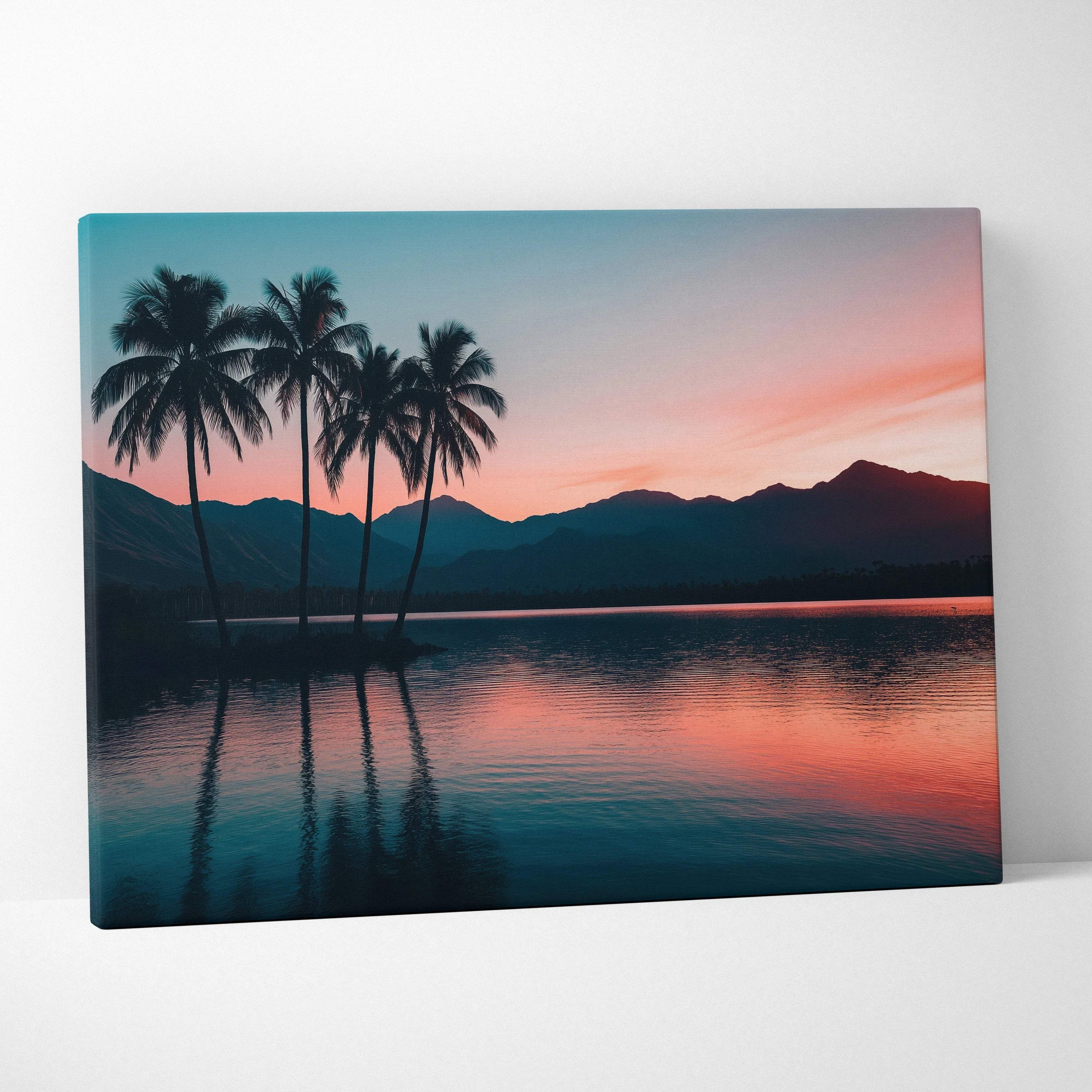 Canvas print of serene sunset with silhouetted palm trees, mountains, lake reflections