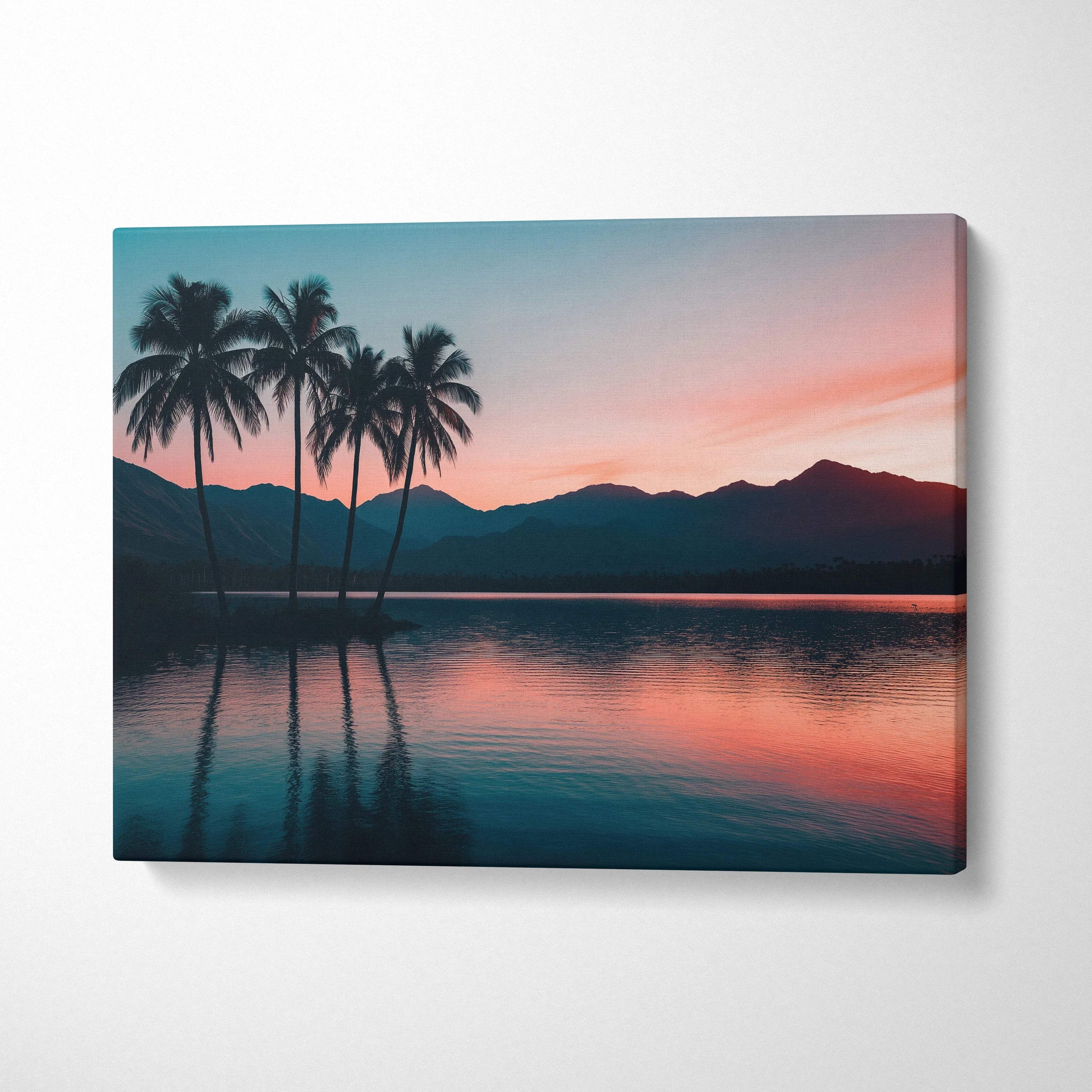 Canvas print of serene sunset over still lake with palm trees and mountains