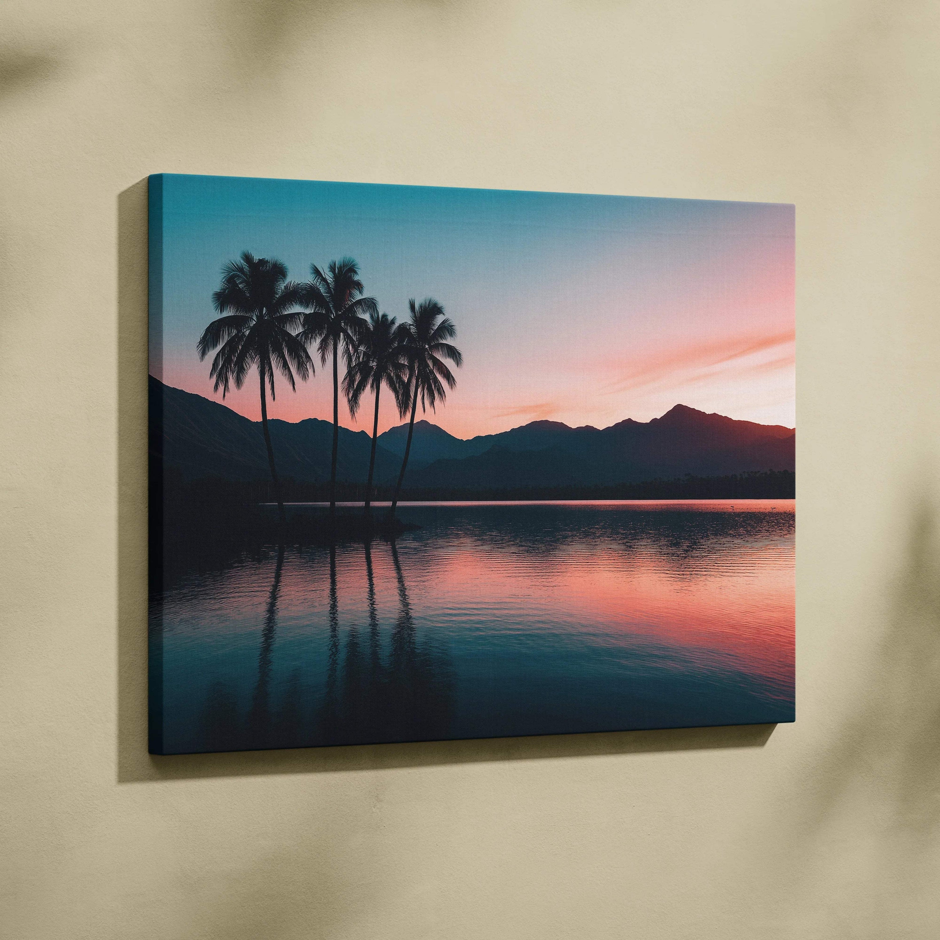 Canvas print of serene sunset with silhouetted palm trees, mountains, lake reflections