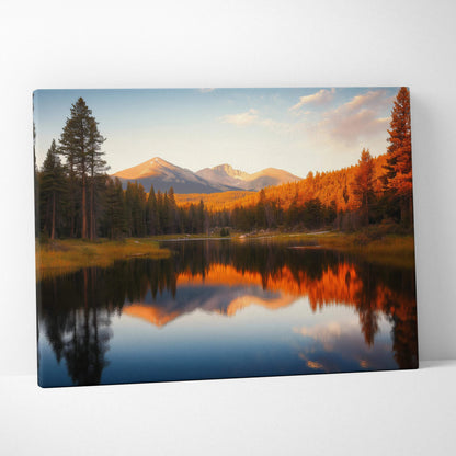 Canvas print of serene mountain lake, pines, snow peaks in golden hour sky