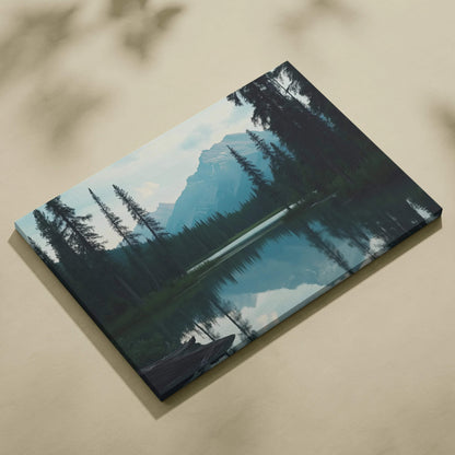 Canvas print of serene mountains behind forest lake in calm blue tones