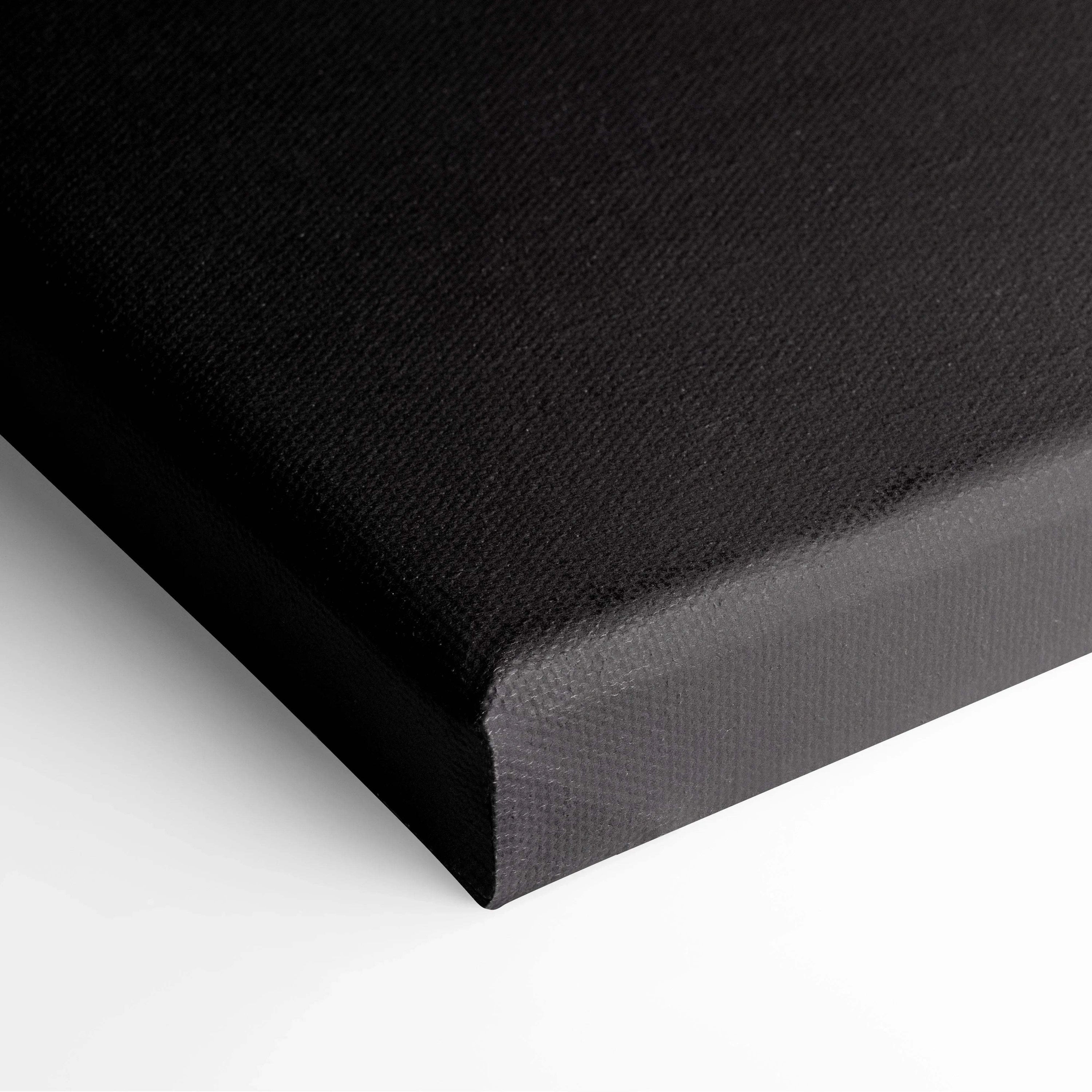 Black stretched canvas corner showcasing texture and clean edges for wall art display.