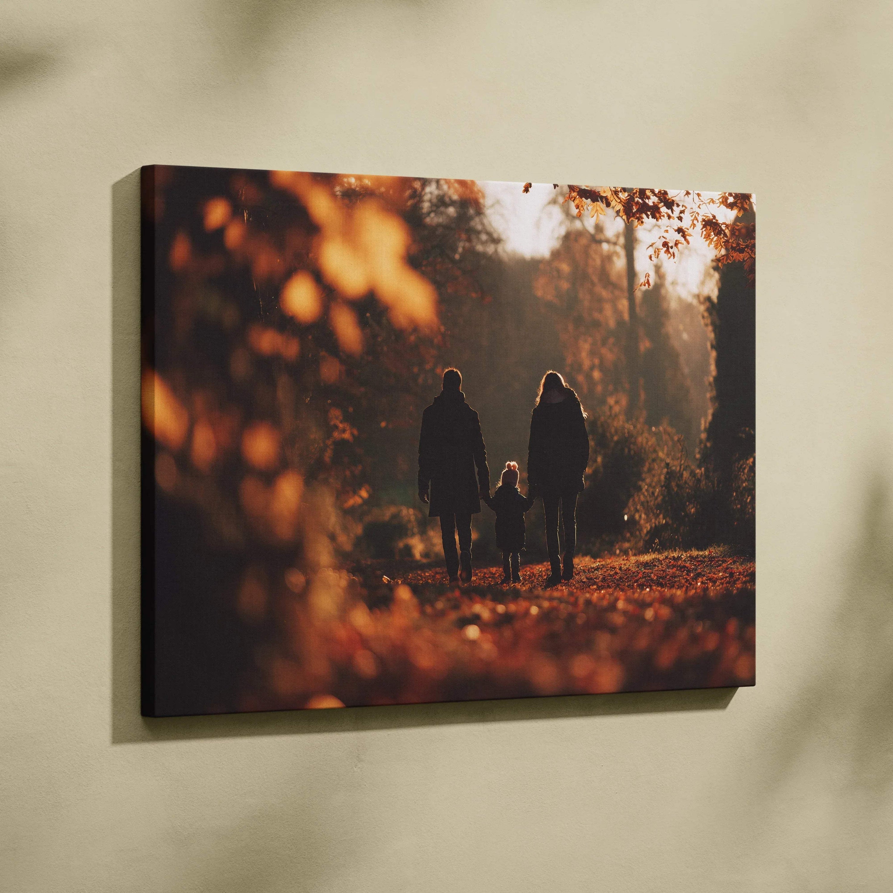 Autumn nature canvas wall art with golden leaves and a family walking at sunset.