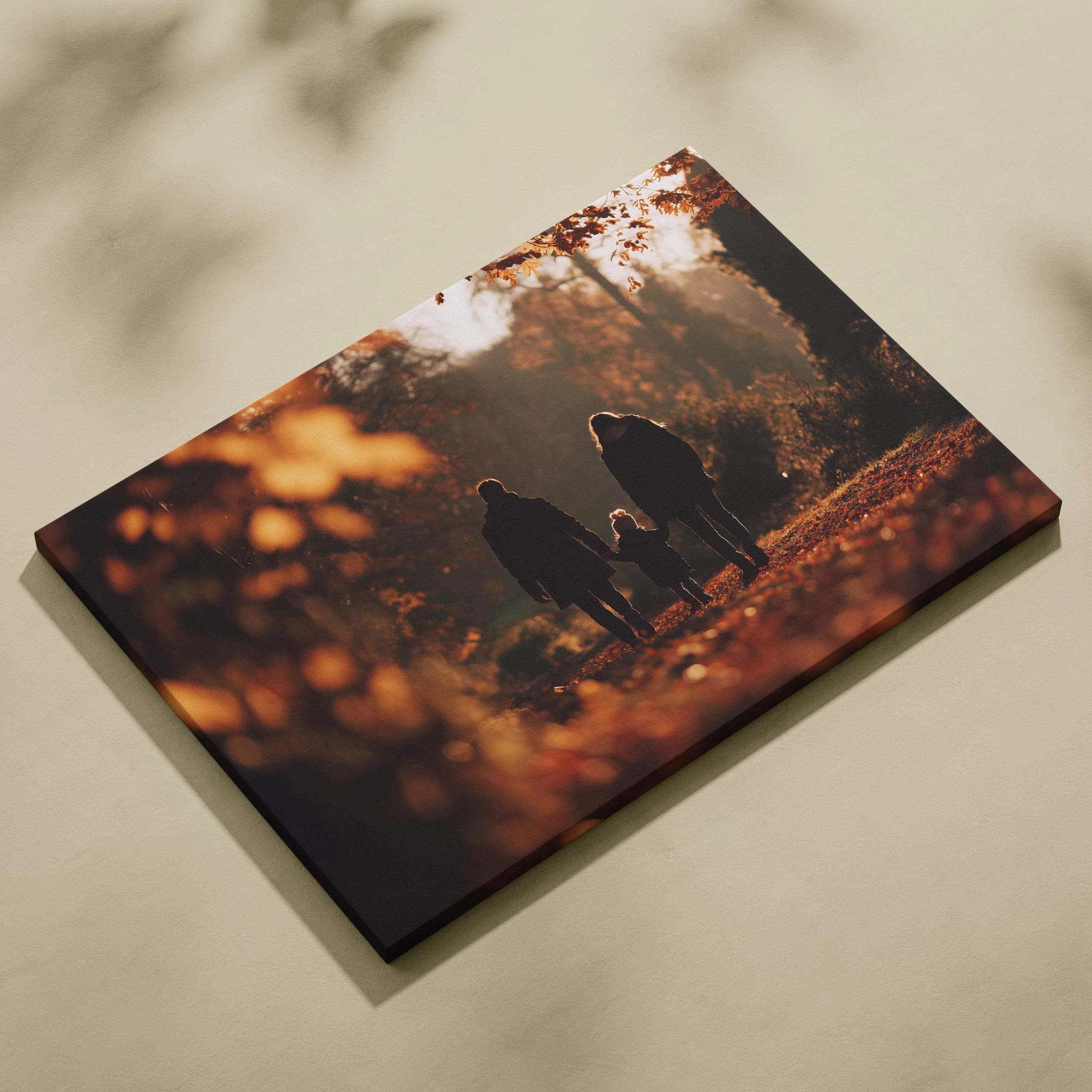 Autumn nature digital art canvas featuring golden leaves and two people walking on a forest path wall art.