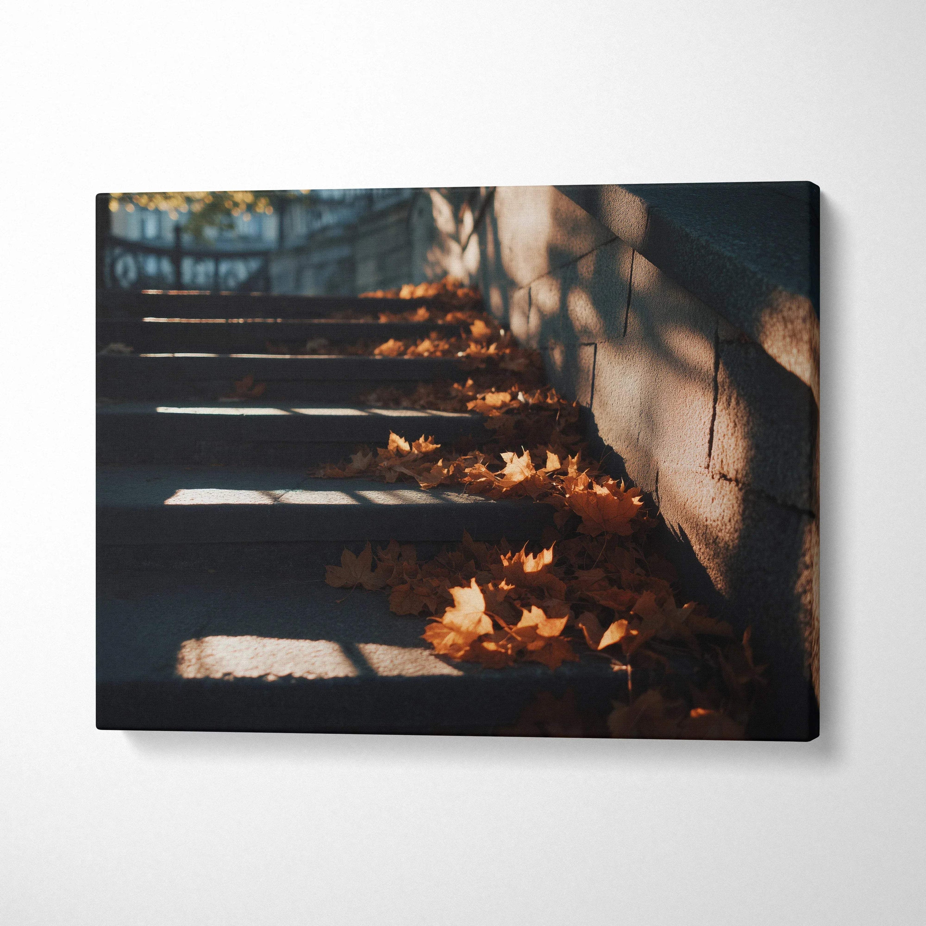 Autumn leaves on stone steps with sunlight and shadows, vibrant canvas wall art.