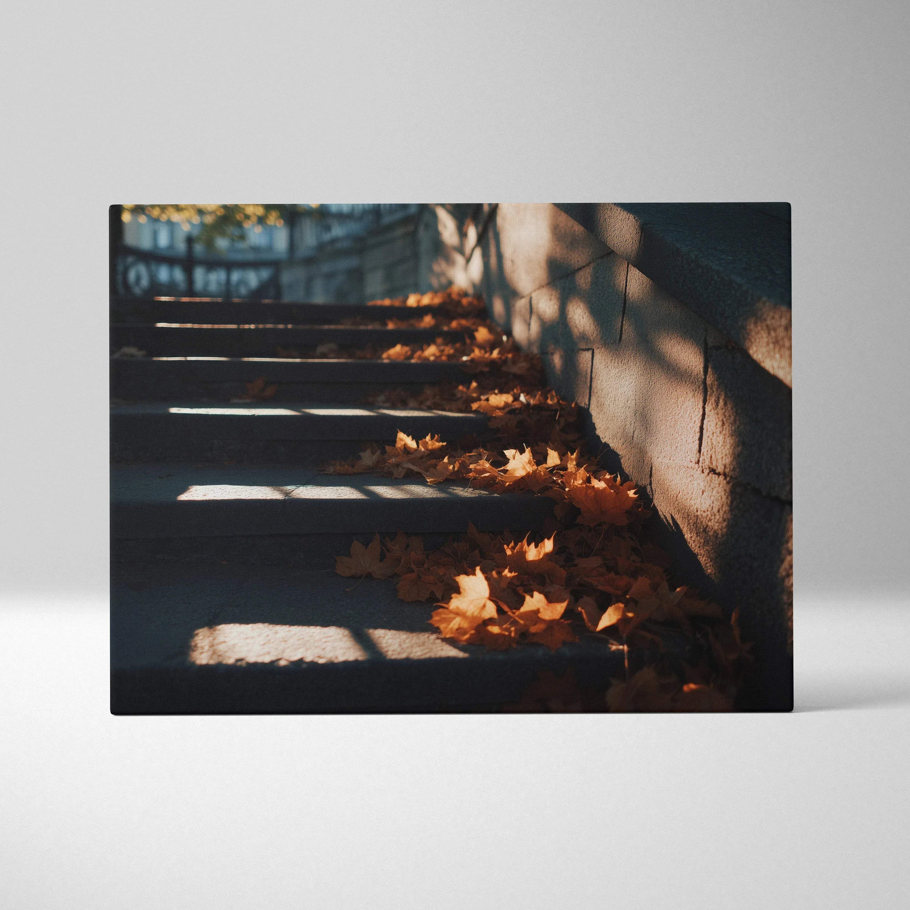 Canvas art of autumn leaves scattered on stone steps with dramatic light and shadow, wall art.