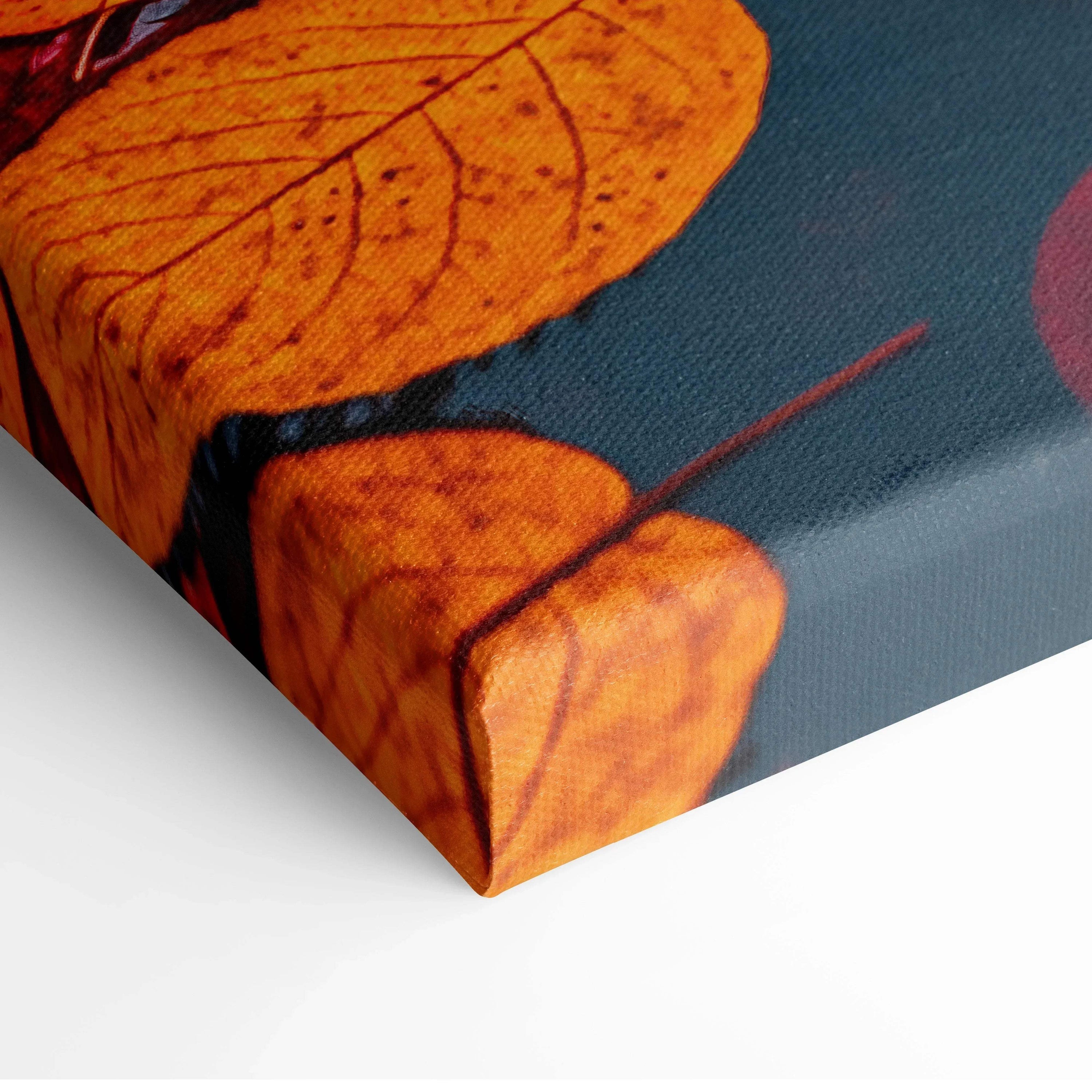 Close-up of autumn leaf detail on canvas wall art with rich orange and blue tones.
