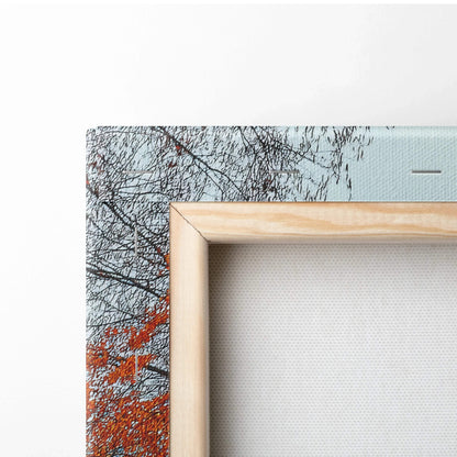 Wooden-framed canvas showing detailed autumn tree branches in digital art wall art style.