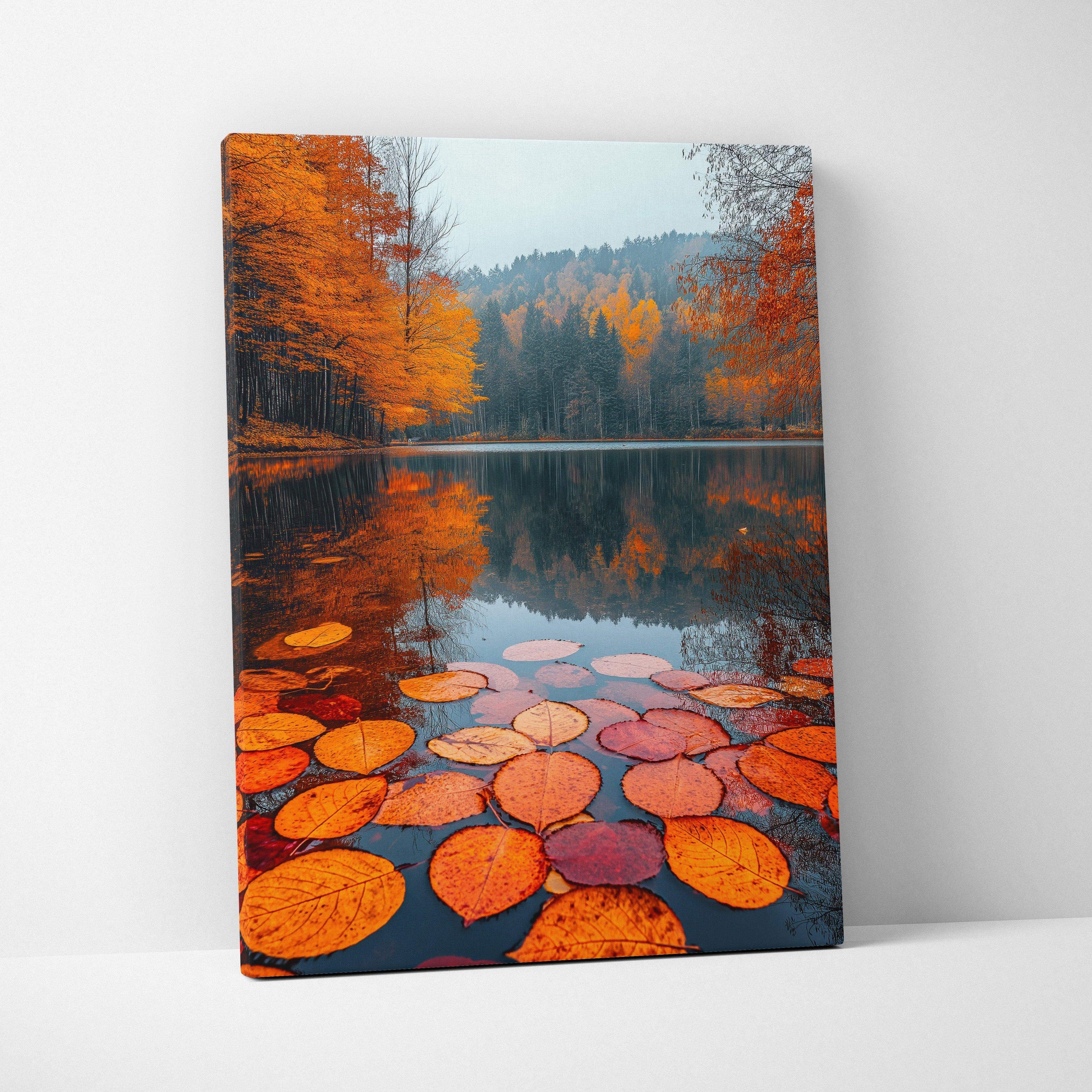 Autumn lake landscape canvas art with vibrant orange leaves floating on water, vertical wall art.