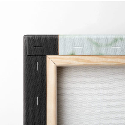 Close-up of wooden frame and canvas texture for wall art decor with stapled edges.