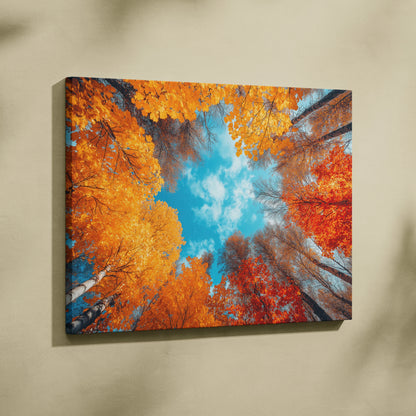 Autumn forest scene with vibrant orange and red leaves against bright blue sky on canvas wall art.