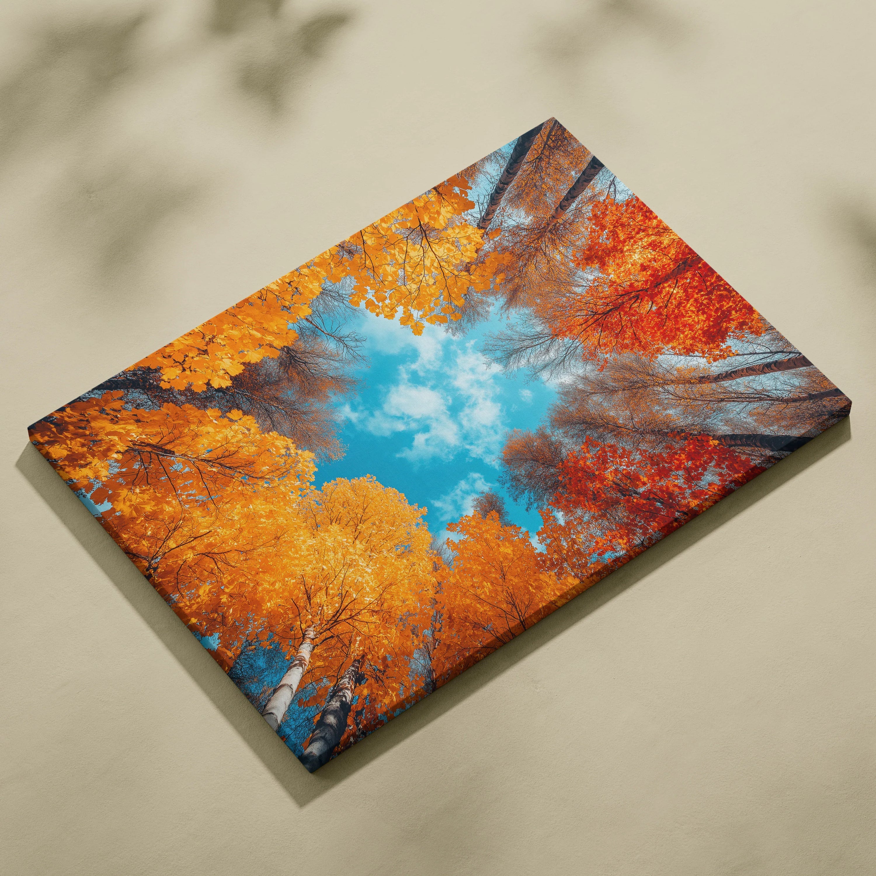 Autumn forest canvas art with vibrant orange and red leaves and blue sky wall art.