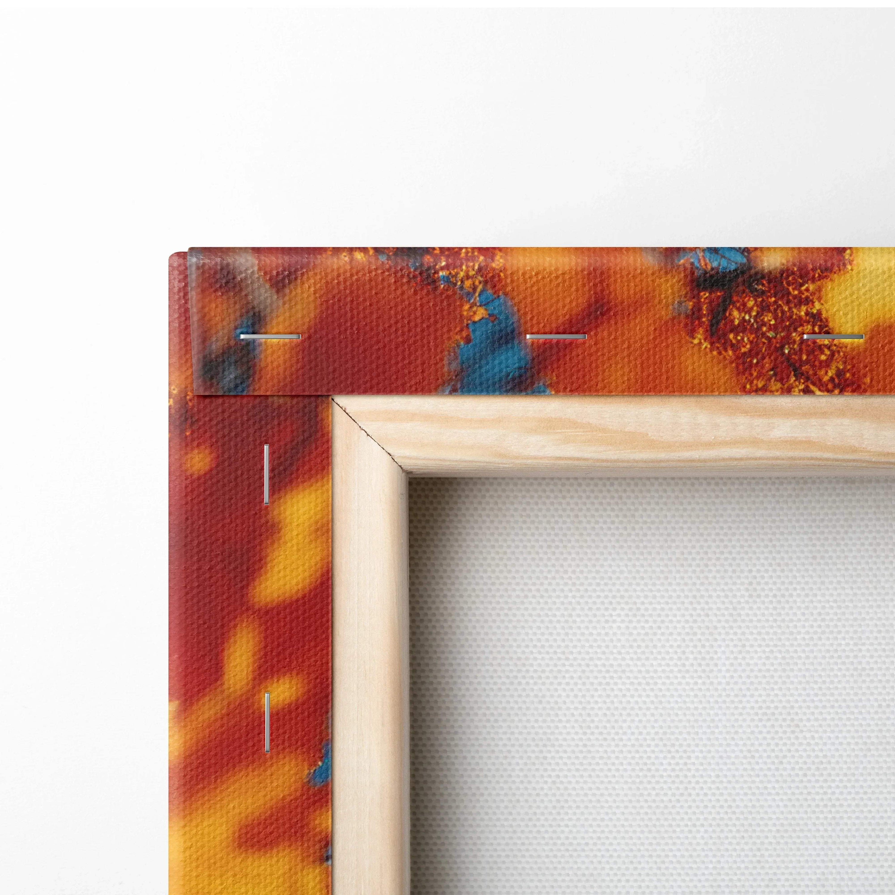 Close-up of stretched canvas art with vibrant autumn leaves and a natural wooden frame edge on wall art canvas.