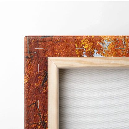 Close-up of vibrant autumn leaves canvas art with wooden frame, textured wall art detail.