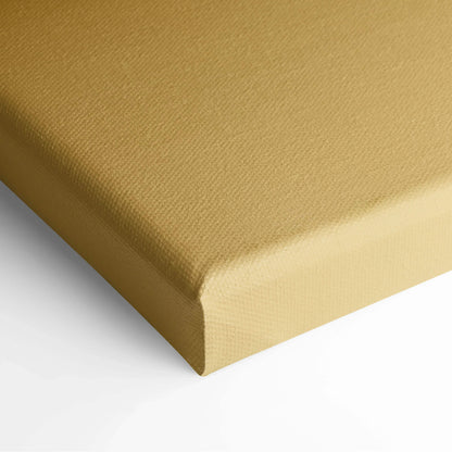Close-up of beige canvas wall art corner with textured fabric and wrapped edges for home decor.